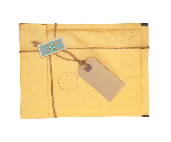 Старый конверт с этикеткой — стоковое фото