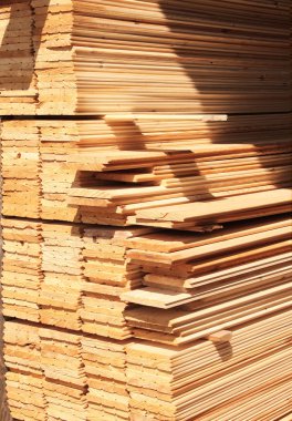 Wooden boards in a warehouse clipart