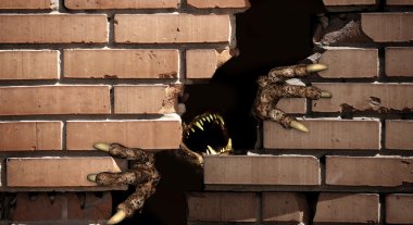 bir canavar, bir tuğla duvar breaking paws
