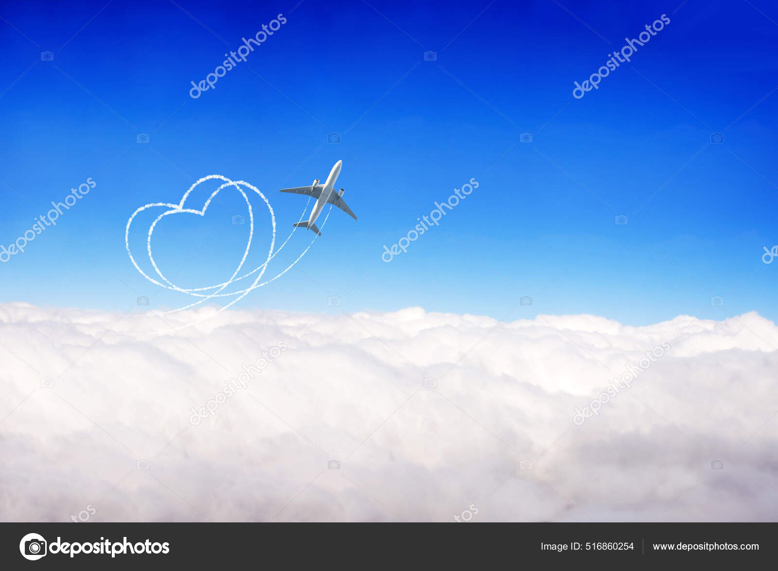 飞机在天空中画出一颗心飞机在蓝天的背景下飞越云层环游世界的爱的概念——图库图片© frenta #516860254, image size:1600x1175