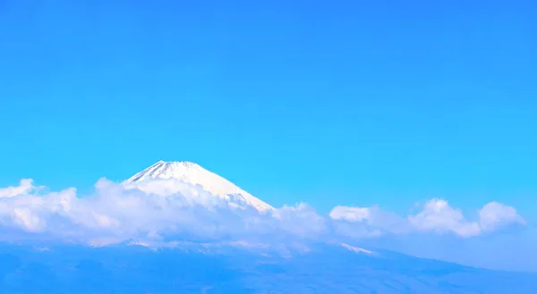 Hermoso Monte Sagrado Fuji Fujiyama Las Nubes Sobre Fondo Azul —  Fotos de Stock