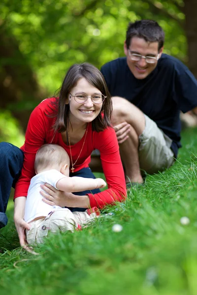 Happy family of three having fun together — Stock Photo, Image