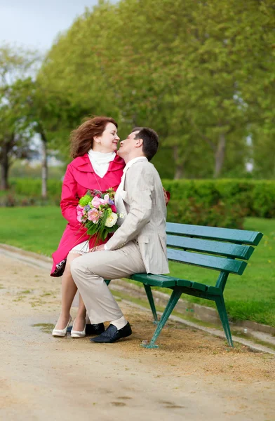 Man and woman having romantic date and kissing Stock Image