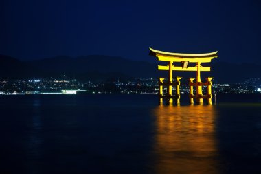 Beautiful night view of Torii gate in Miyajima, Japan clipart