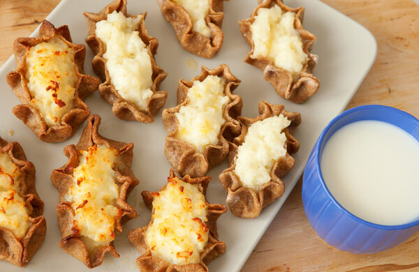 Traditional karelian pasties from Finland with cup of milk