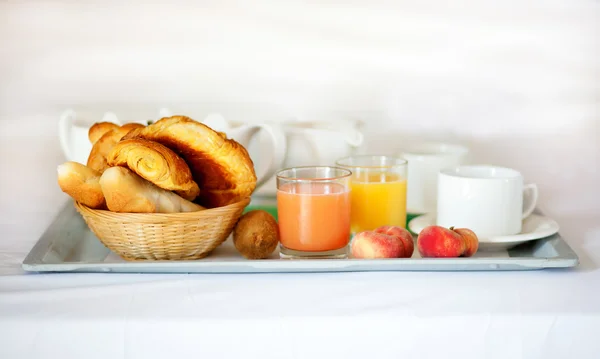 Delicious breakfast served in bed — Stock Photo, Image