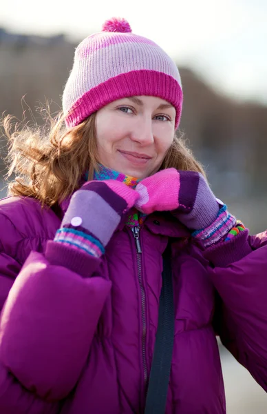 Beautiful young girl in bright winter clothes — Stock Photo, Image