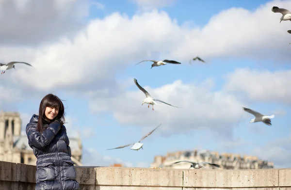 Happy brunette girl in Paris enjoying windy spring day — Stock Photo, Image