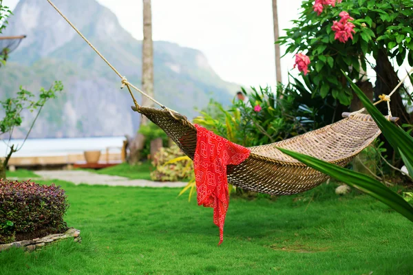 Hammock with red pareo on a tropical resort — Stock Photo, Image