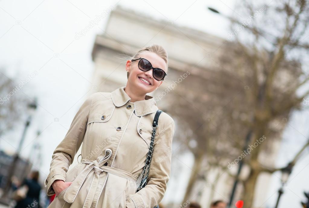 Happy young lady in Paris