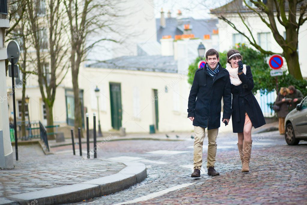 Dating couple walking on Montmartre