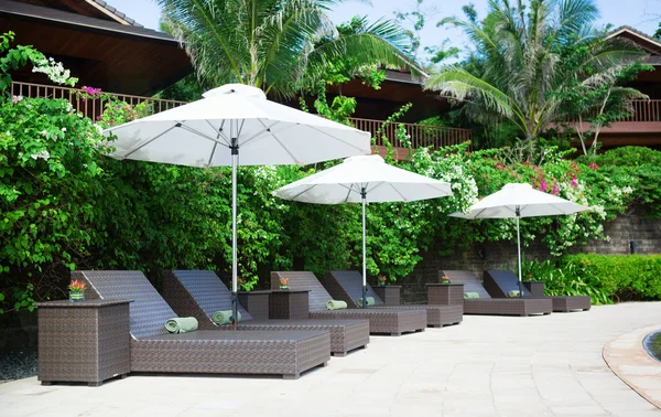 Beach chairs on a tropical resort — Stock Photo, Image