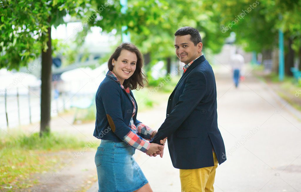 Couple walking together in park