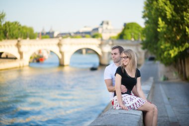 Couple in Paris on a summer day clipart