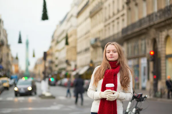 Girl with taken away coffee on a street — Stock Photo, Image