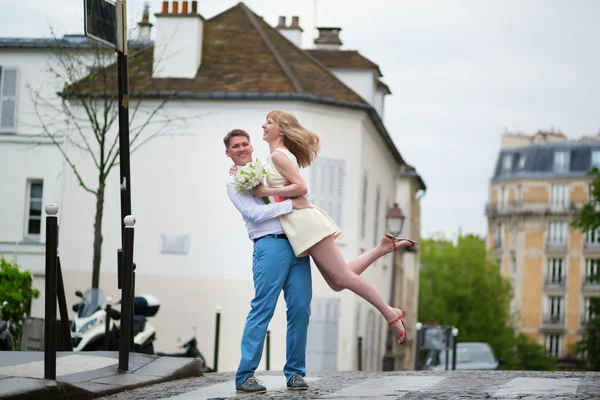 Happy bride and groom hugging on a street of Paris — Stock Photo, Image