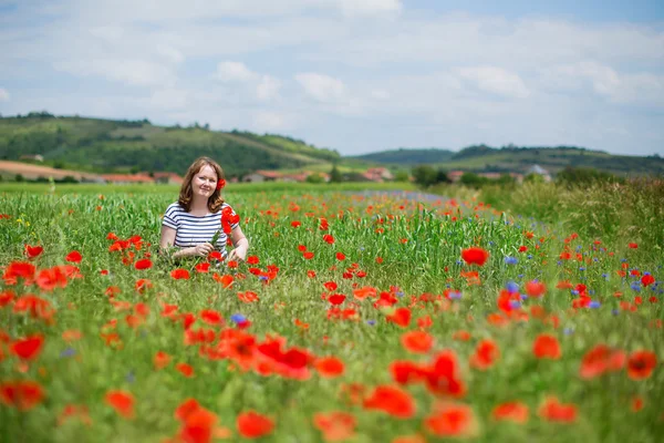 Beautiful young woman on meadow — Stock Photo, Image