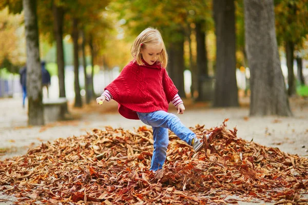 Adorable Preschooler Girl Walking Kicking Fallen Leaves Tuileries Garden Paris — Stock Photo, Image
