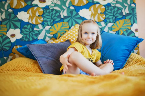 Adorable Playful Little Girl Sitting Bed Nicely Decorated Bedroom — Stock Photo, Image