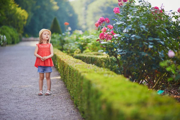 Adorable Toddler Girl Enjoying Rosehip Flowers Summer Park Happy Kid — Stock Photo, Image