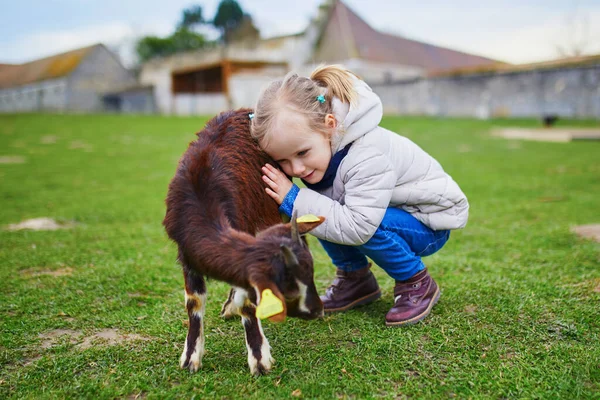 Adorable Little Girl Playing Goats Farm Child Familiarizing Herself Animals — Stock Photo, Image