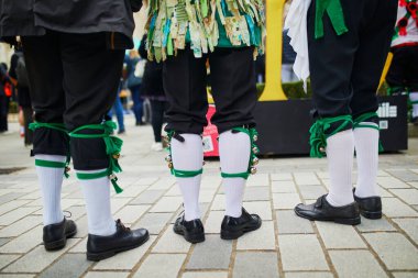 Closeup of men legs in traditional Scottish costumes