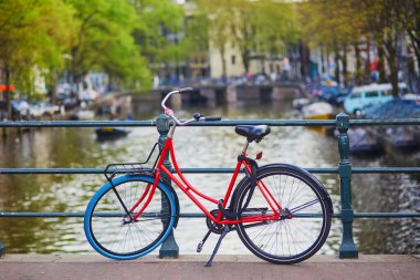 Lots of bikes parked on the bridges and embankments in Amsterdam, the Netherlands