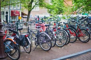 Lots of bikes parked on the bridges and embankments in Amsterdam, the Netherlands
