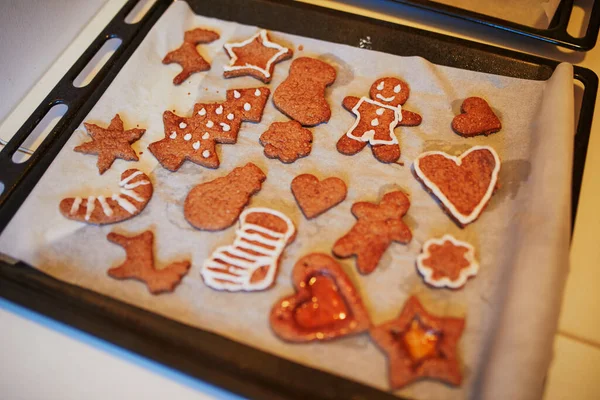 Handmade ginger bread Christmas cookies made at home. Celebrating winter holidays with kids