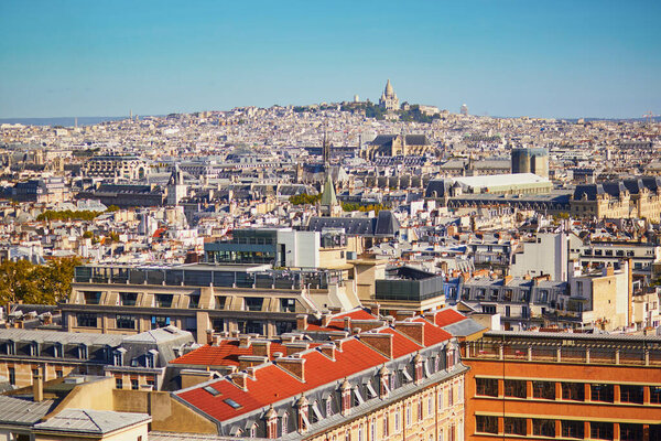 Scenic Parisian cityscape. Aerial view of Sacre-Coeur Cathedral and Montmartre hill in Paris, France
