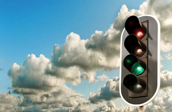 Big clouds and traffic light. — Stock Photo, Image