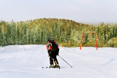 Ski man on the hill.