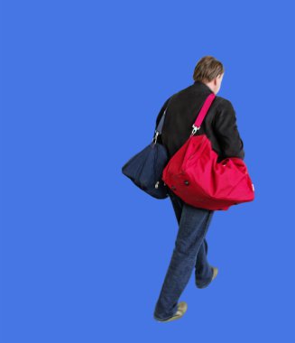 adamın elinde iki çanta.