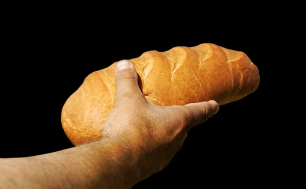 Людина з хлібом . — стокове фото