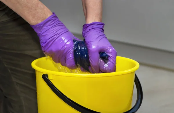 Woman Squeezes Floor Cloth Yellow Bucket — Stock Photo, Image