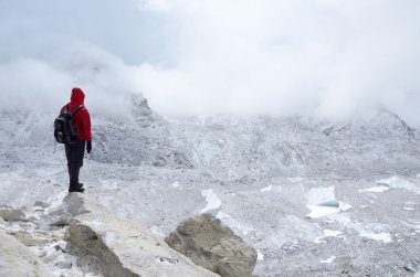 Mountaineer standing near Khumbu Icefall ,Everest region,Nepal clipart