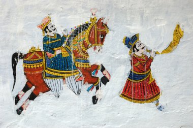 Traditional colourful medieval wall painting in Udaipur,India clipart