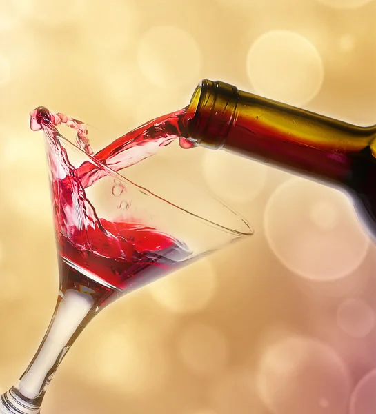 Glass and bottle of red wine — Stock Photo, Image