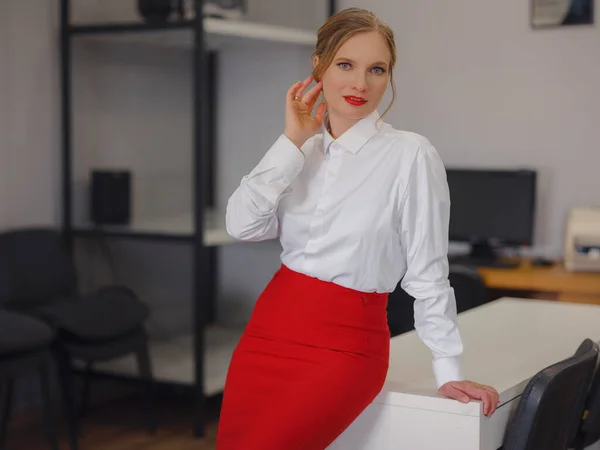 Business woman working in office. Online business, young professional in workplace. Portrait of attractive cheerful lady hr leader director real estate agency broker at work place station indoors