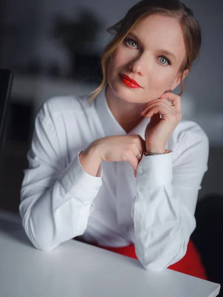 Business woman working in office. Online business, young professional in workplace. Portrait of attractive cheerful lady hr leader director real estate agency broker at work place station indoors