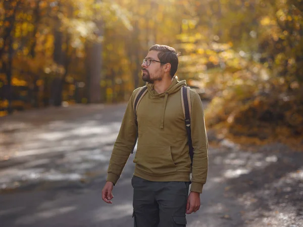 Young Handsome Man Posing Autumn Forest Young Hipster Guy Backpack — Fotografia de Stock