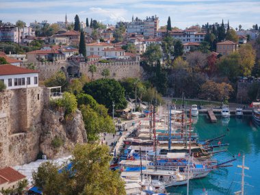Antalya, Turkey - November 2021: view of the old port in the city, travel to turkey, old town Kaleci. discover interesting places and popular attractions and walks