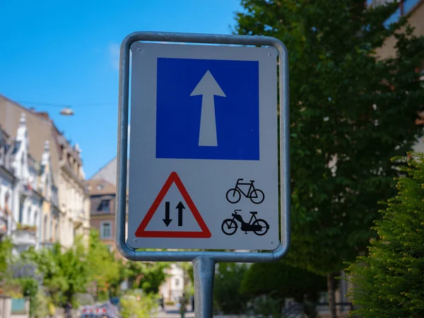 Two Way Directional Arrows Sign for bike and one way for cars. Basel city