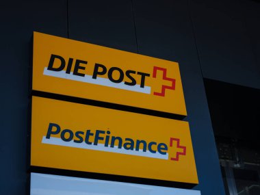 Basel, Switzerland - July 4 2022: sign of the swiss post and postauto transportation