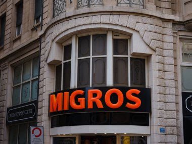 Basel, Switzerland - July 4 2022: entrance to Migros supermarket in Basel. Migros is Switzerlands largest retail company.