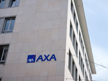 Basel, Switzerland - July 4 2022: facade of the building housing the headquarters of Axa, an international French group specializing in insurance and asset management