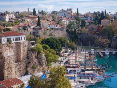 Antalya, Turkey - November 2021: view of the old port in the city, travel to turkey, old town Kaleci. discover interesting places and popular attractions and walks
