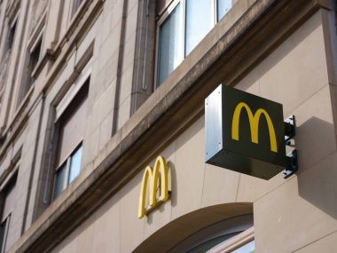 Basel, Switzerland - July 4 2022: McDonalds Restaurants of Basel. McDonalds logo. McDonalds is the worlds largest chain of hamburger fast food restaurants