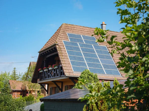 Walshwiller is commune in north-east of France in Grand Est region, house with solar panel, energy saving and renewable energy concept