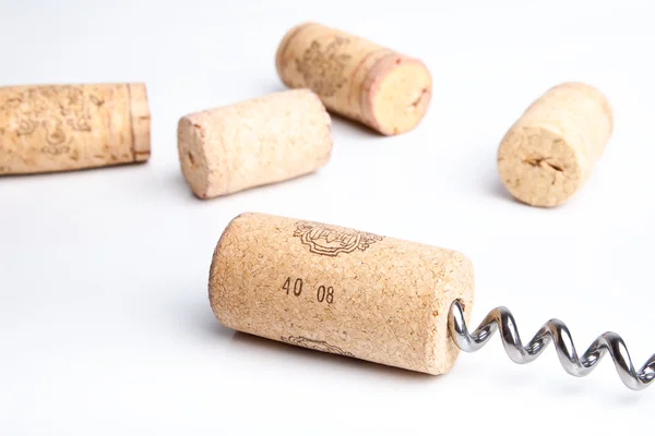 Cork with corkscrew on white background — Stock Photo, Image